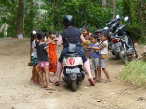 Natasha drawing a crowd by giving out strawberries (I think they were actually wanting money..!)