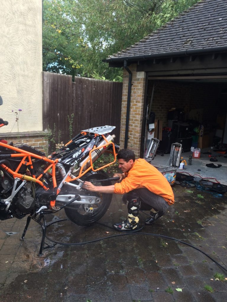 Dean cleaning the bike...